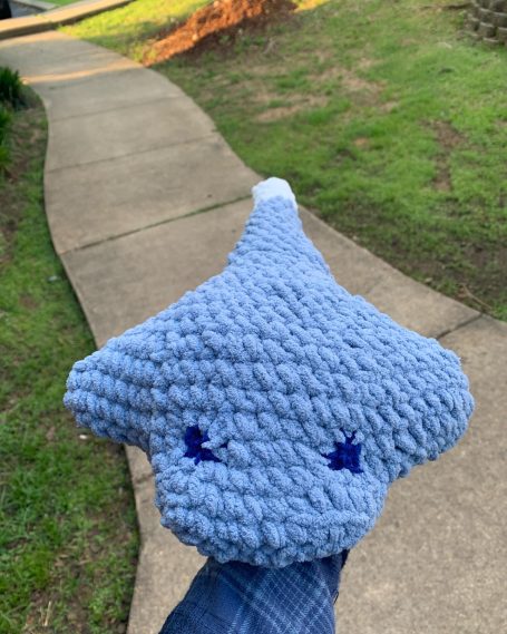 blue and white crocheted stingray with eyes